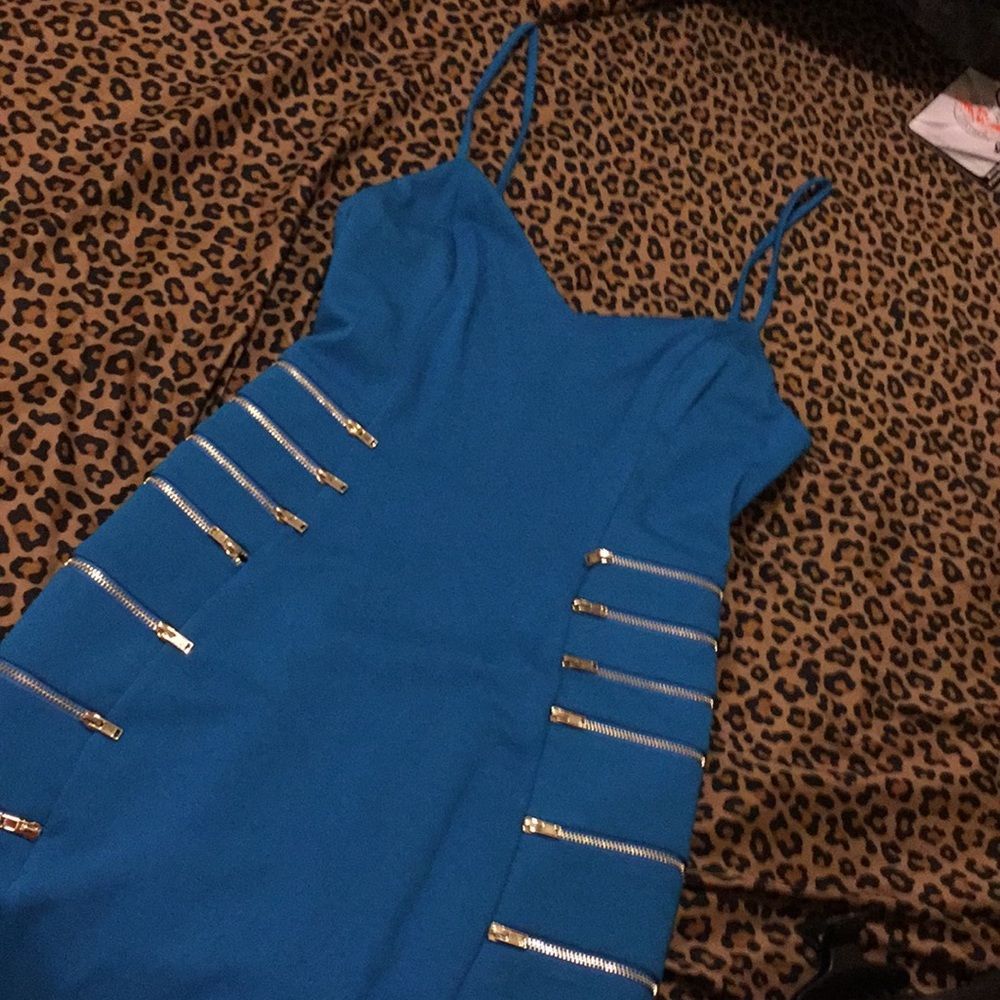 bebe turquoise sexy dress Size M brand NWOT