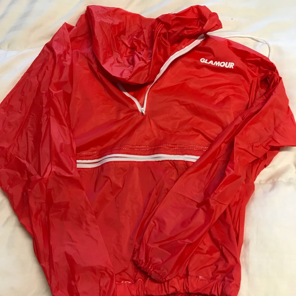 Hooded red “Glamour” windbreaker