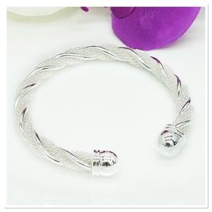 Boutique Jewelry - Sparkling Silver Twist Cuff Boutique Jewelry - Sparkling Silver Twist Cuff
