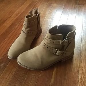 Cute tan booties with buckle details