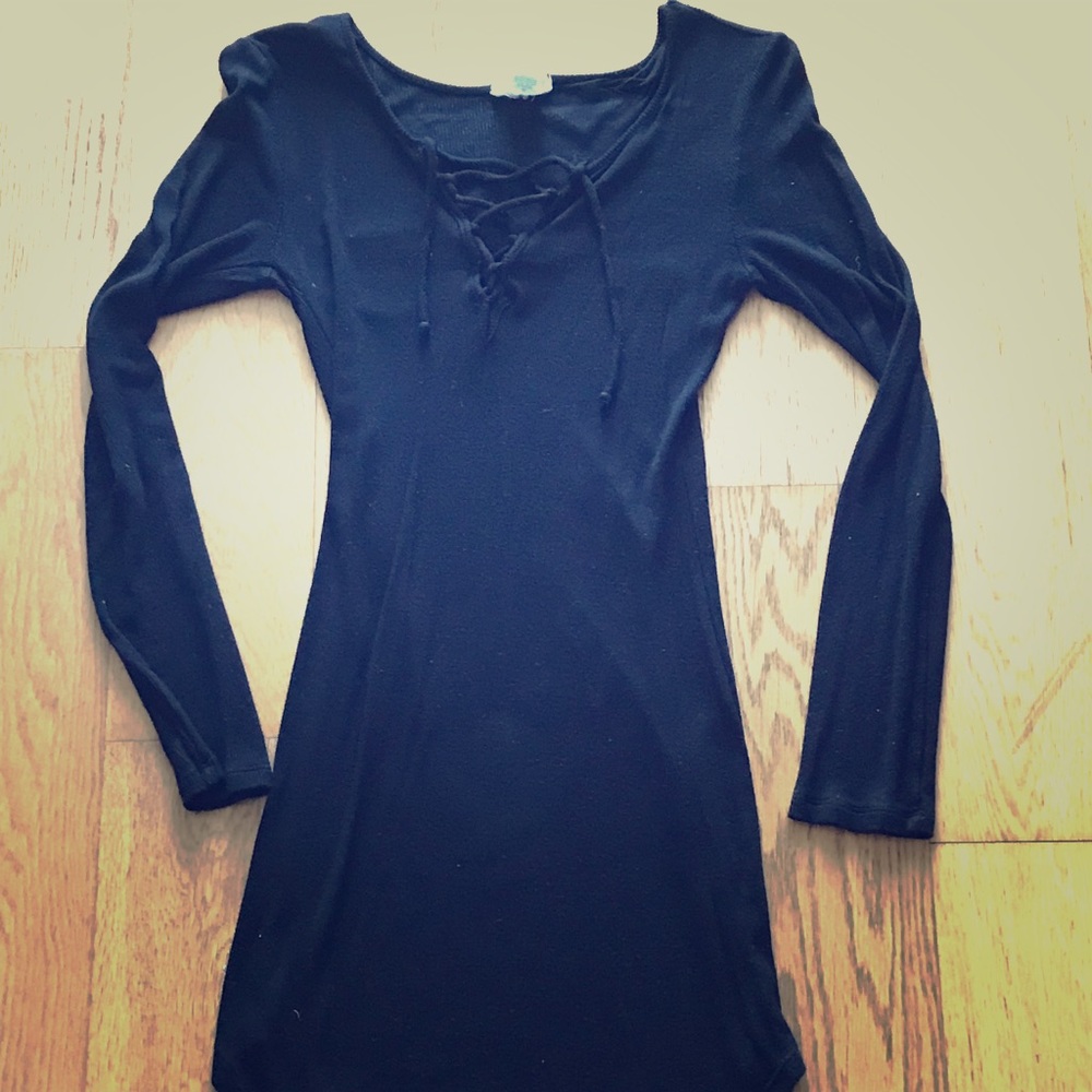 Long sleeve form fitting little black dress!