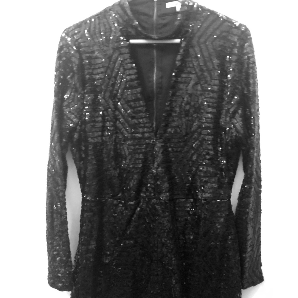 Sparkle and shine in this romper!