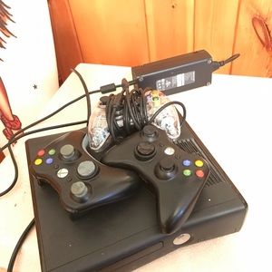 Xbox 360 and 3 controllers.