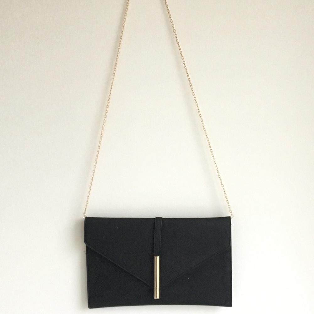 Midnight black clutch with gold chain strap