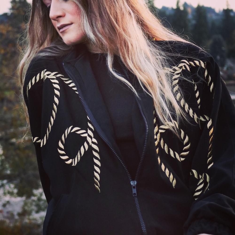 black/gold windbreaker