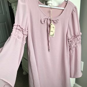 Boutique dress with bell sleeves