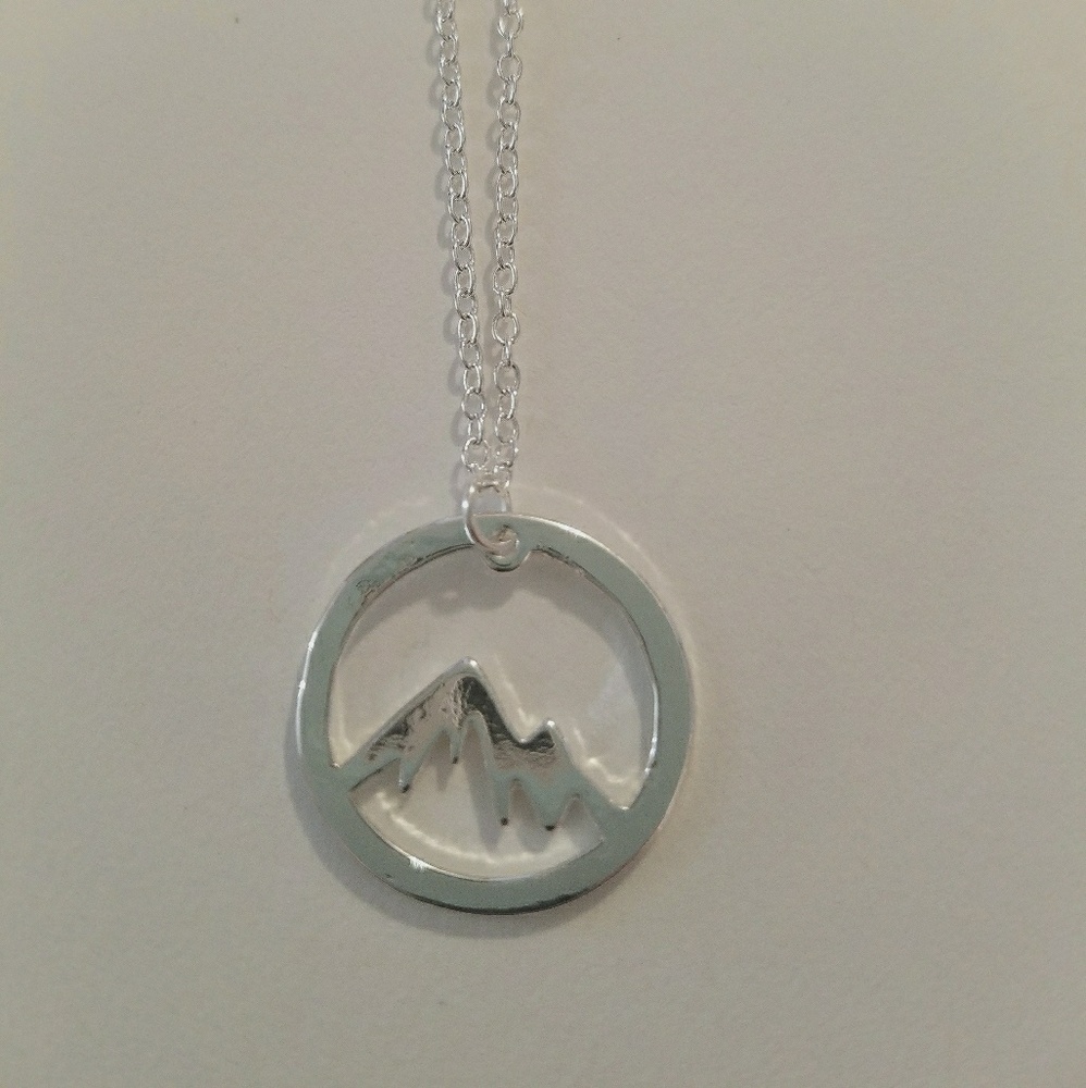 Silver plated mountain medallion necklace