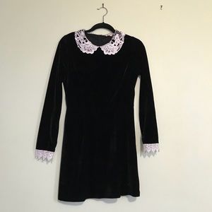 Long sleeve little black dress with lace trim