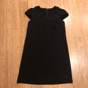 Black sheath dress with Peter Pan collar