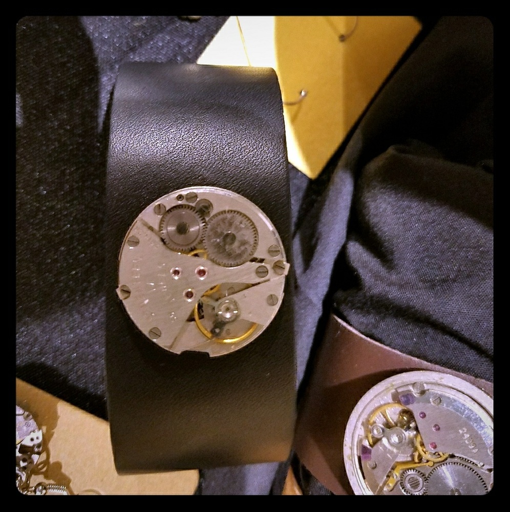 Leather cuff bracelet with vintage watch works