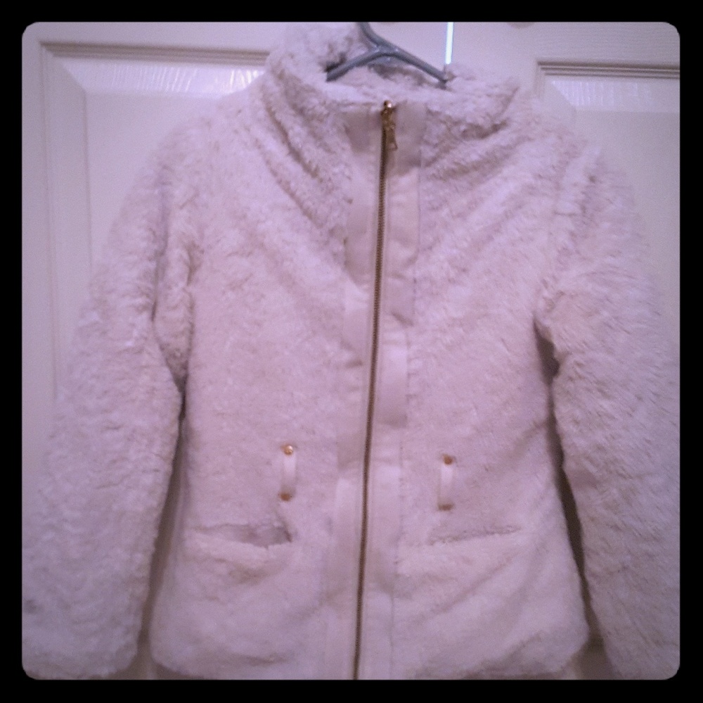 White faux fur coat