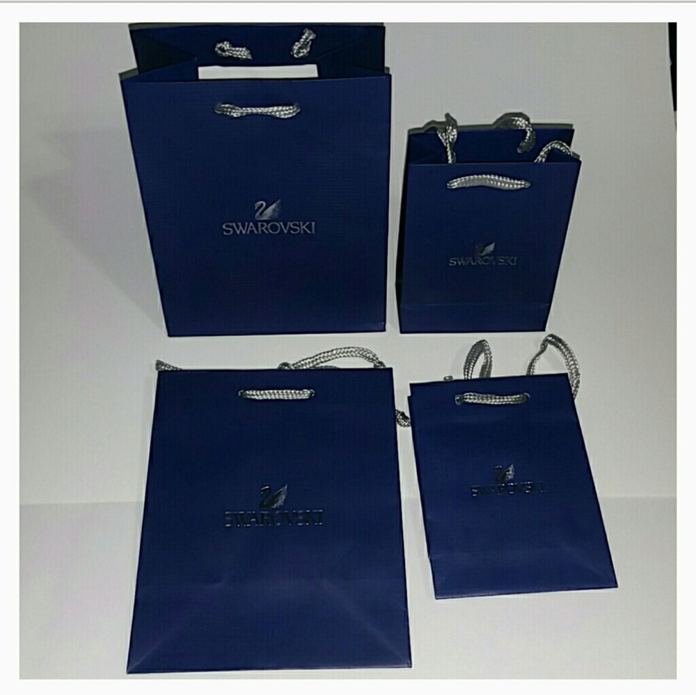 SET 4 GIFT BAGS AUTHENTIC SWAROVSKI 2 MD 2 SM NEW! I CAN SEE IF I CAN ADD MORE!