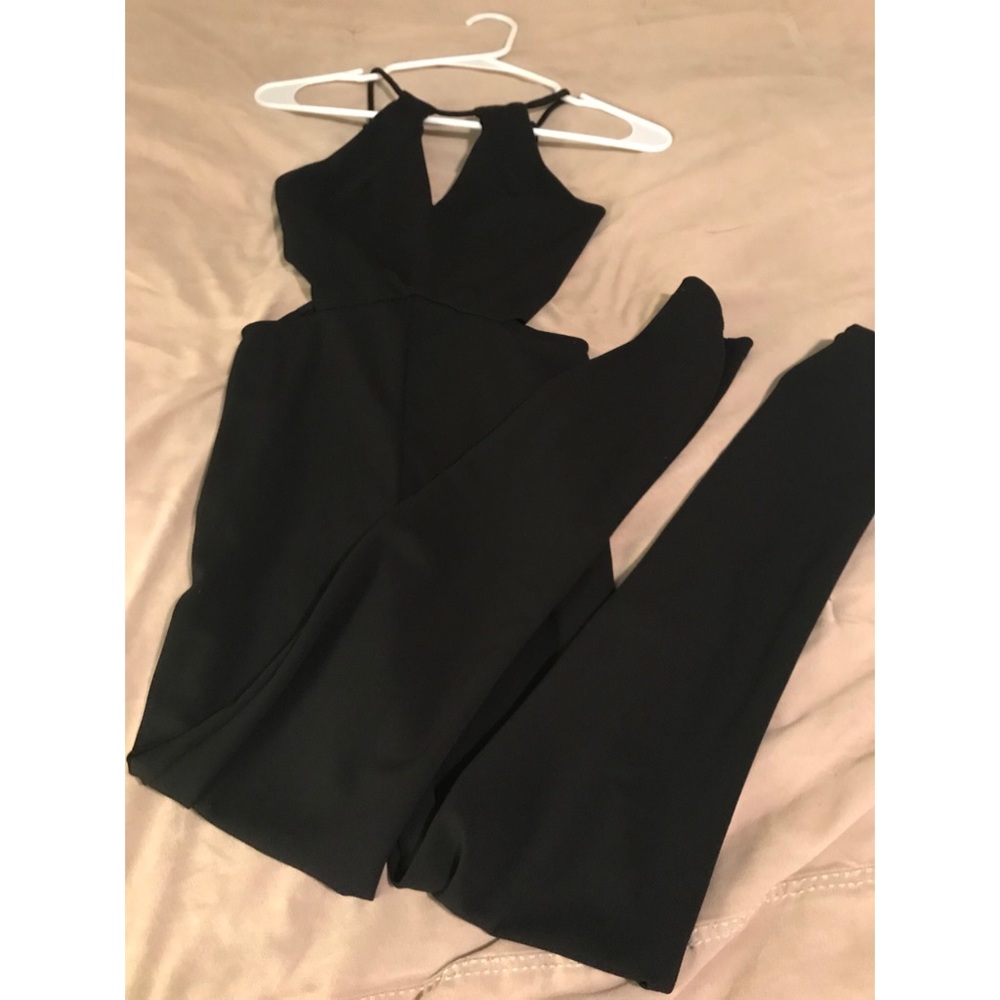Black jumpsuit. Worn once! Perfect for holidays! ✨