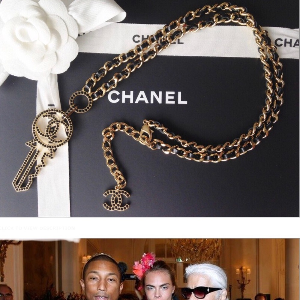 Chanel iconic  leather woven gold chain with key.