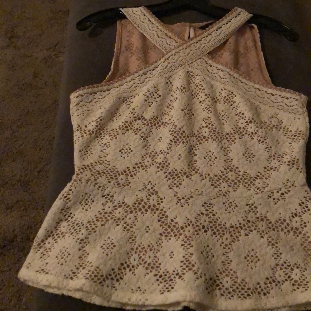 Beige and tan cris cross front top