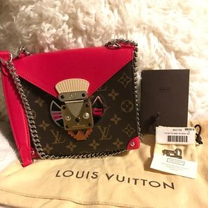 Louis Vuitton Pochette mask chain handbag