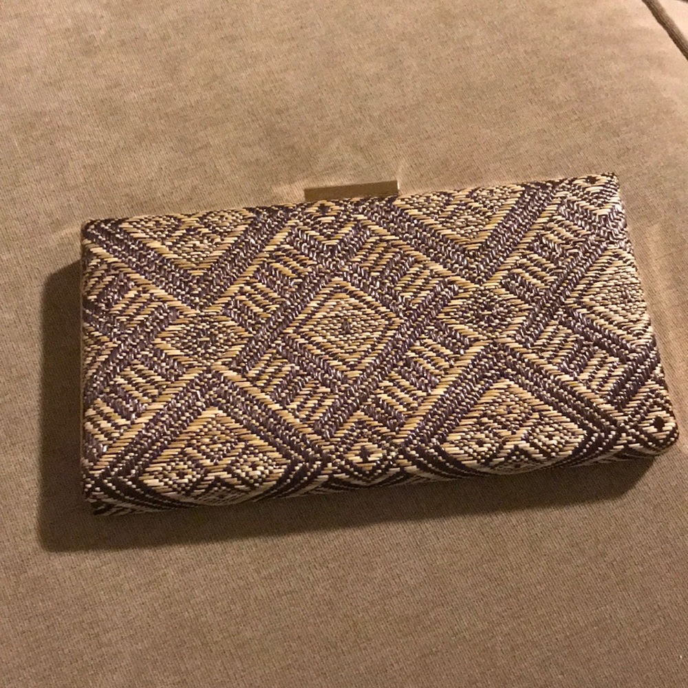 Brown and tan clutch