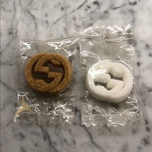 Two Gucci sugar cubes