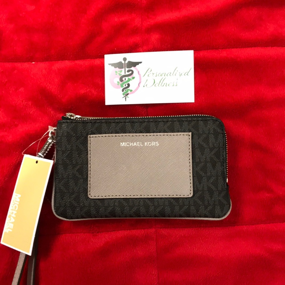 MK NWT Wristlet.