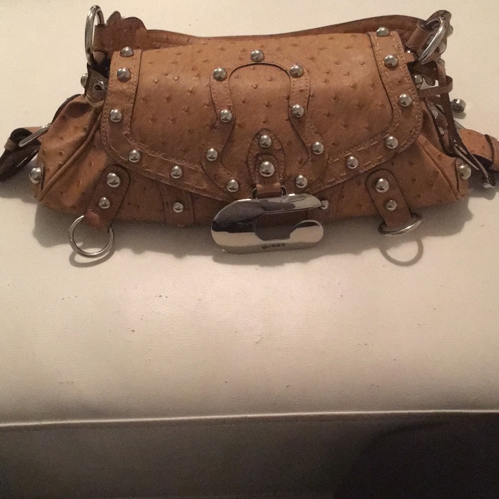 Guess tan faux "ostrich" skin purse.