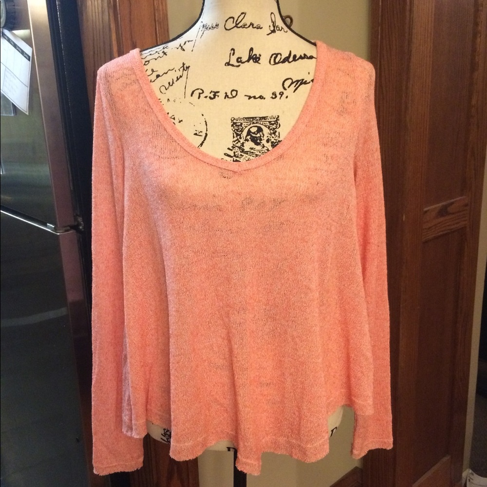 Raw edge swing sweater