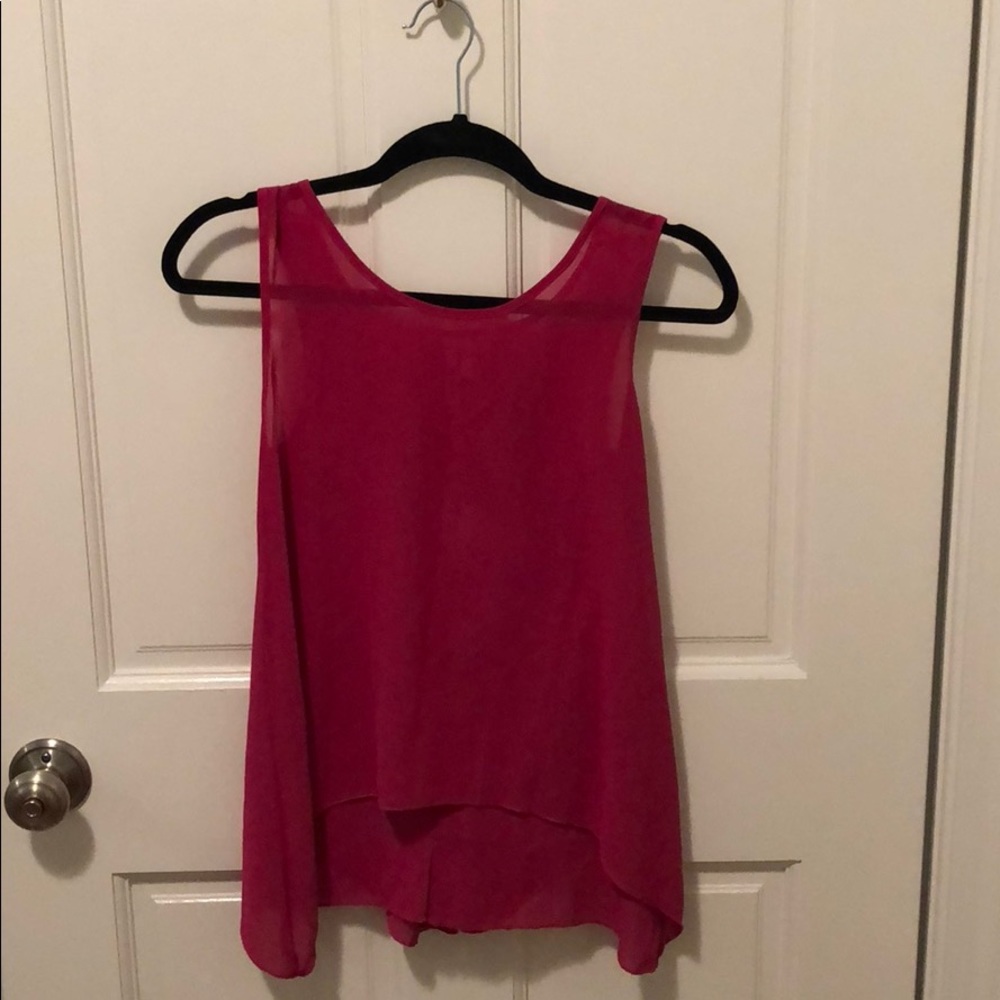 Pink top with open peep hole back