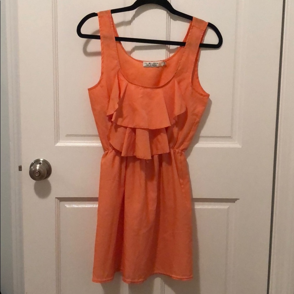 Peach ruffle front dress
