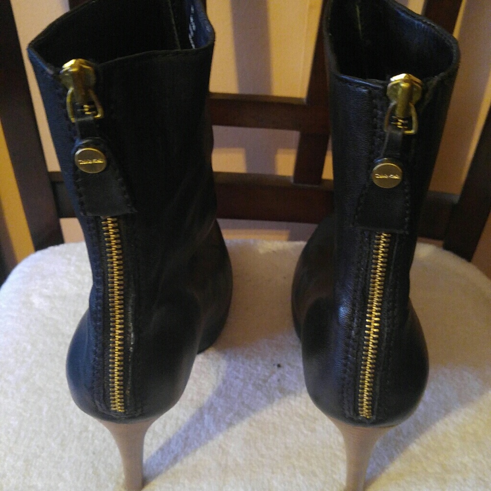 Black leather Calvin Klein boots