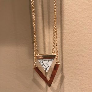 Brand new double V gold necklace with marble decor