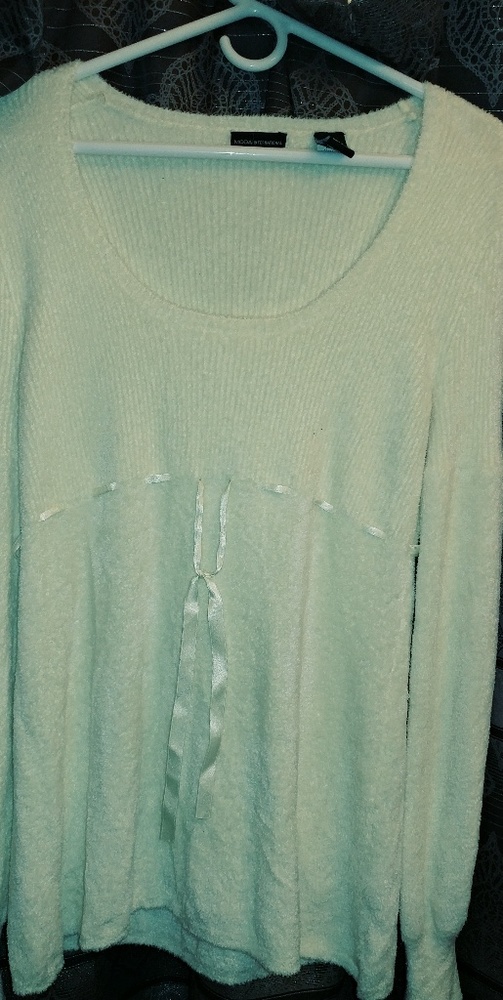 Cream color sweater..
