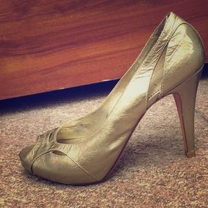 Gold peep-toe Nicole Miller heels