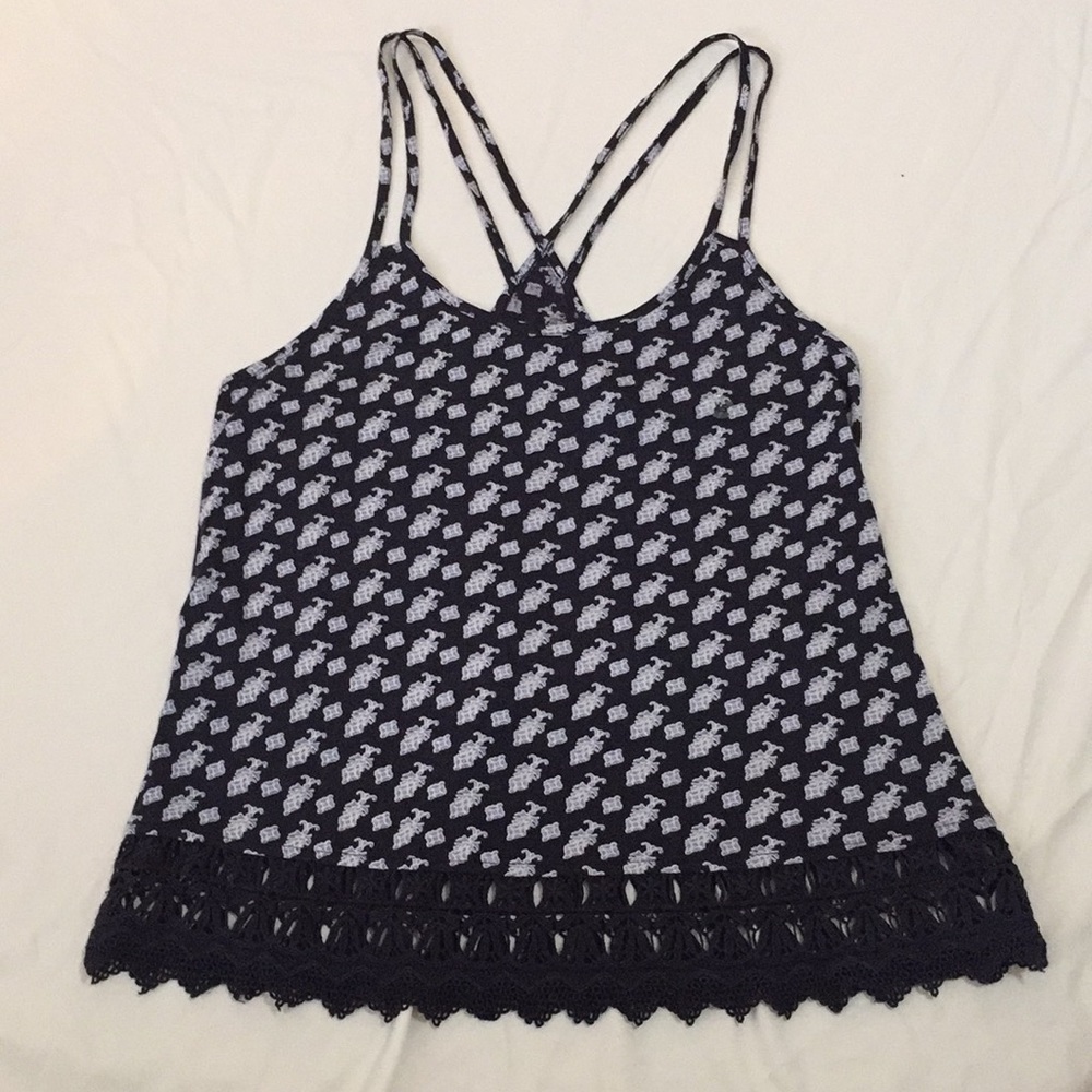 Blue patterned tank with crochet botton