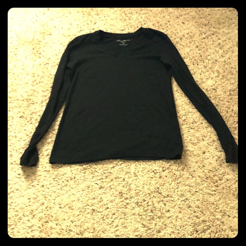 Used solid black long sleeve shirt.