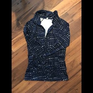 UA dark blue and white sweater