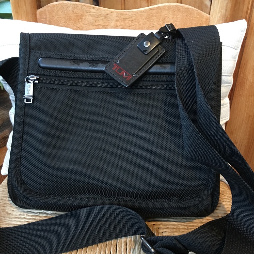 Tumi pocket bag small new without tags