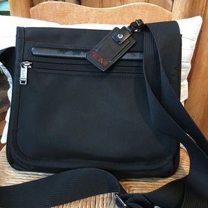 Tumi pocket bag small new without tags