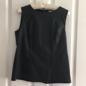 Sleeveless, looks/feels like leather fitted top