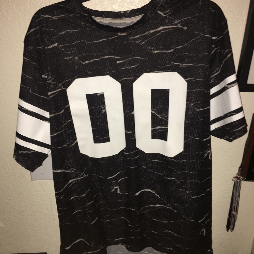 On the Byas T shirt/ Jersey