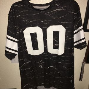 On the Byas T shirt/ Jersey
