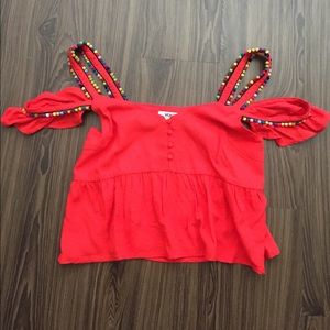 Red off shoulder top w/ button detail & pompoms