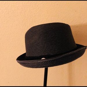 This is a Vintage 70’s Custom woven straw hat .