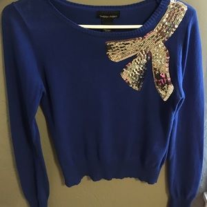 Royal blue sweater with sequin bow