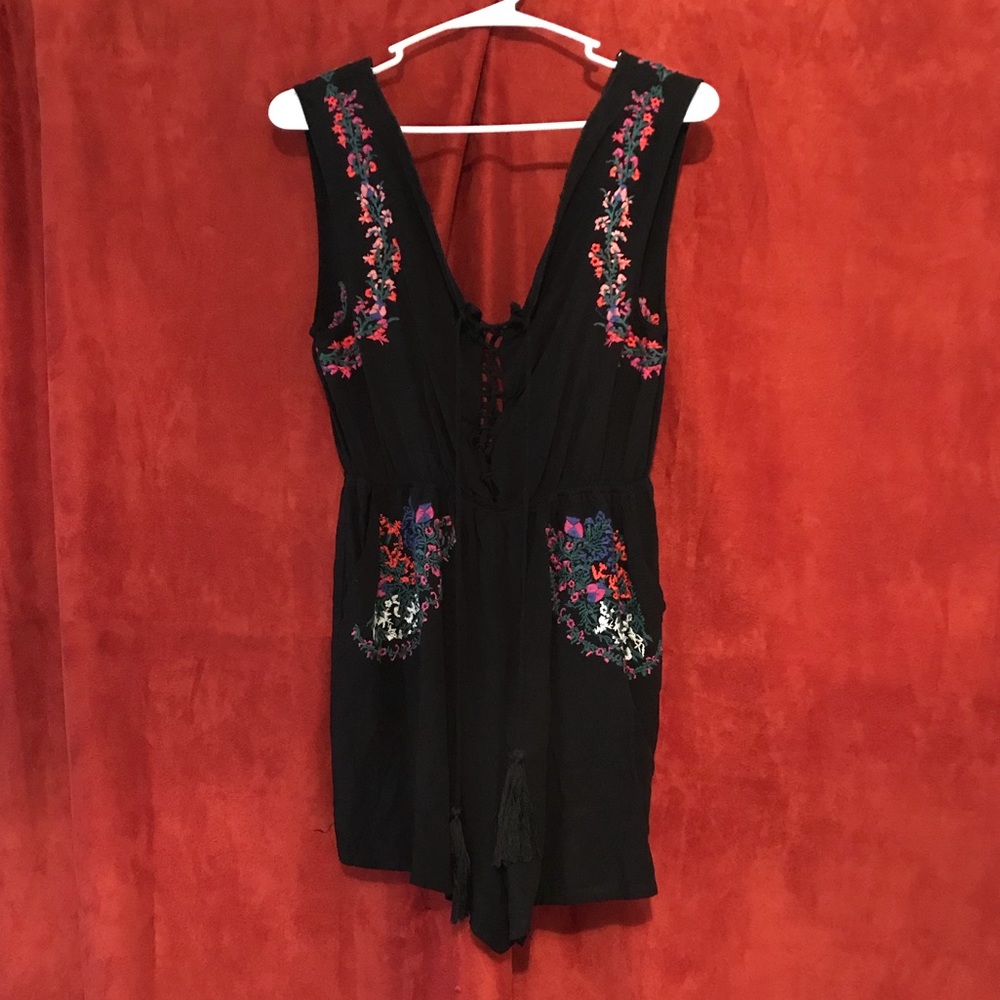 Black and flowered romper.