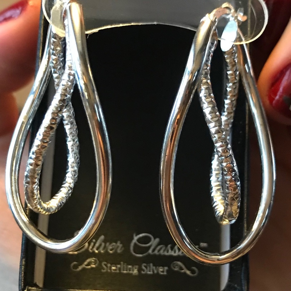Sterling silver earrings. Never worn!
