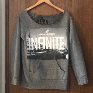 “Infinite” quote off the shoulder sweater