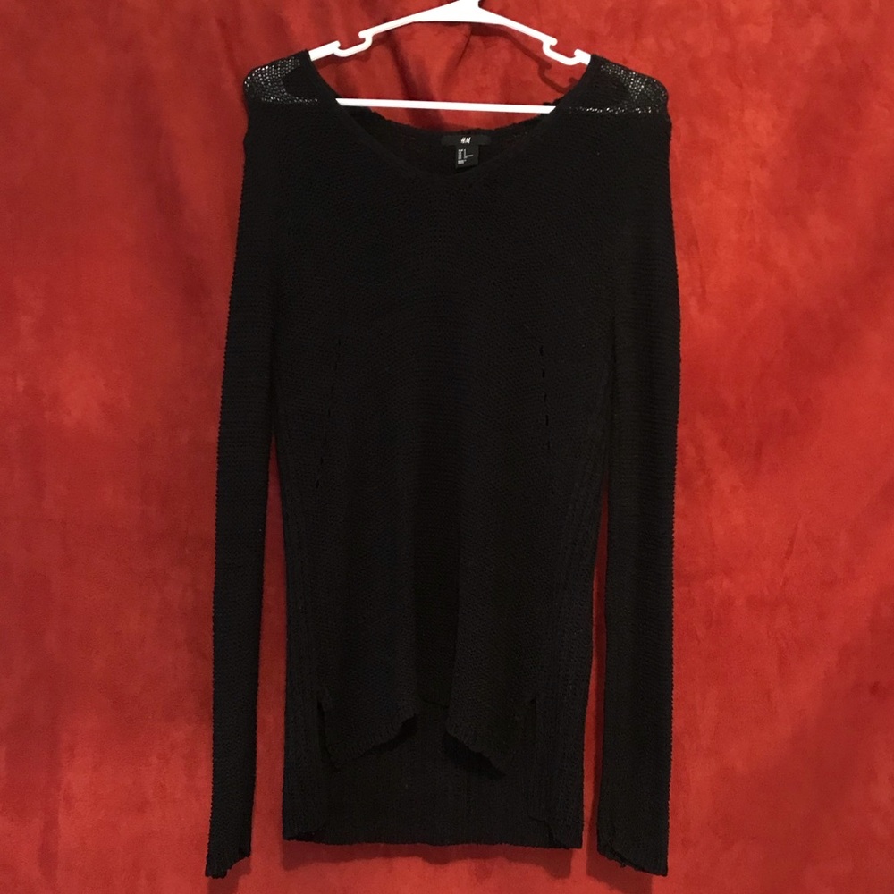 Black knitted light weight sweater.