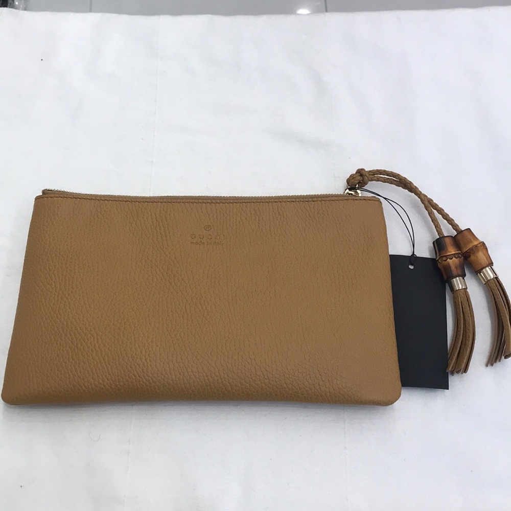 BRAND NEW & AUTHENTIC! Gucci bamboo tassel clutch