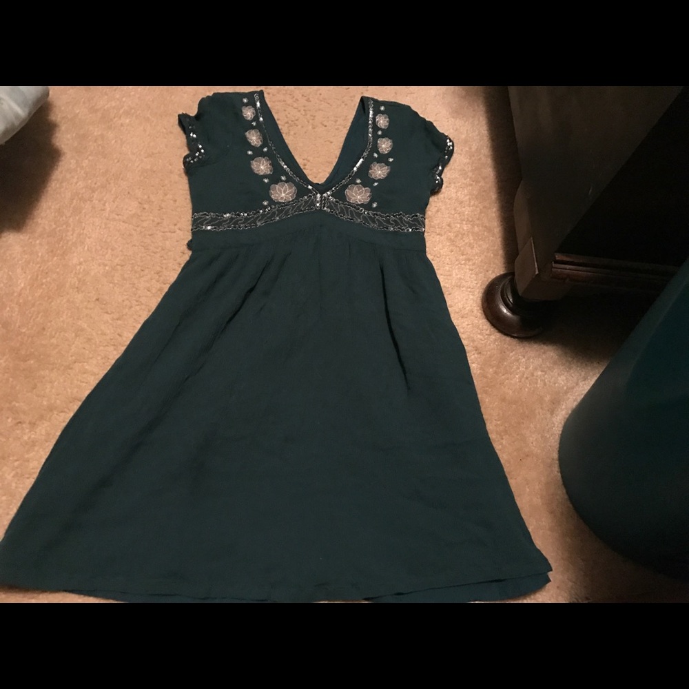 Cute embellished green dress