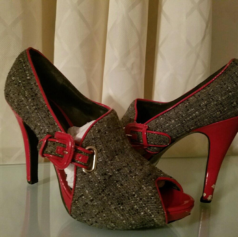heels - few small scrapes on back of heels
