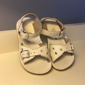 White Saltwater sandals with heart cutouts
